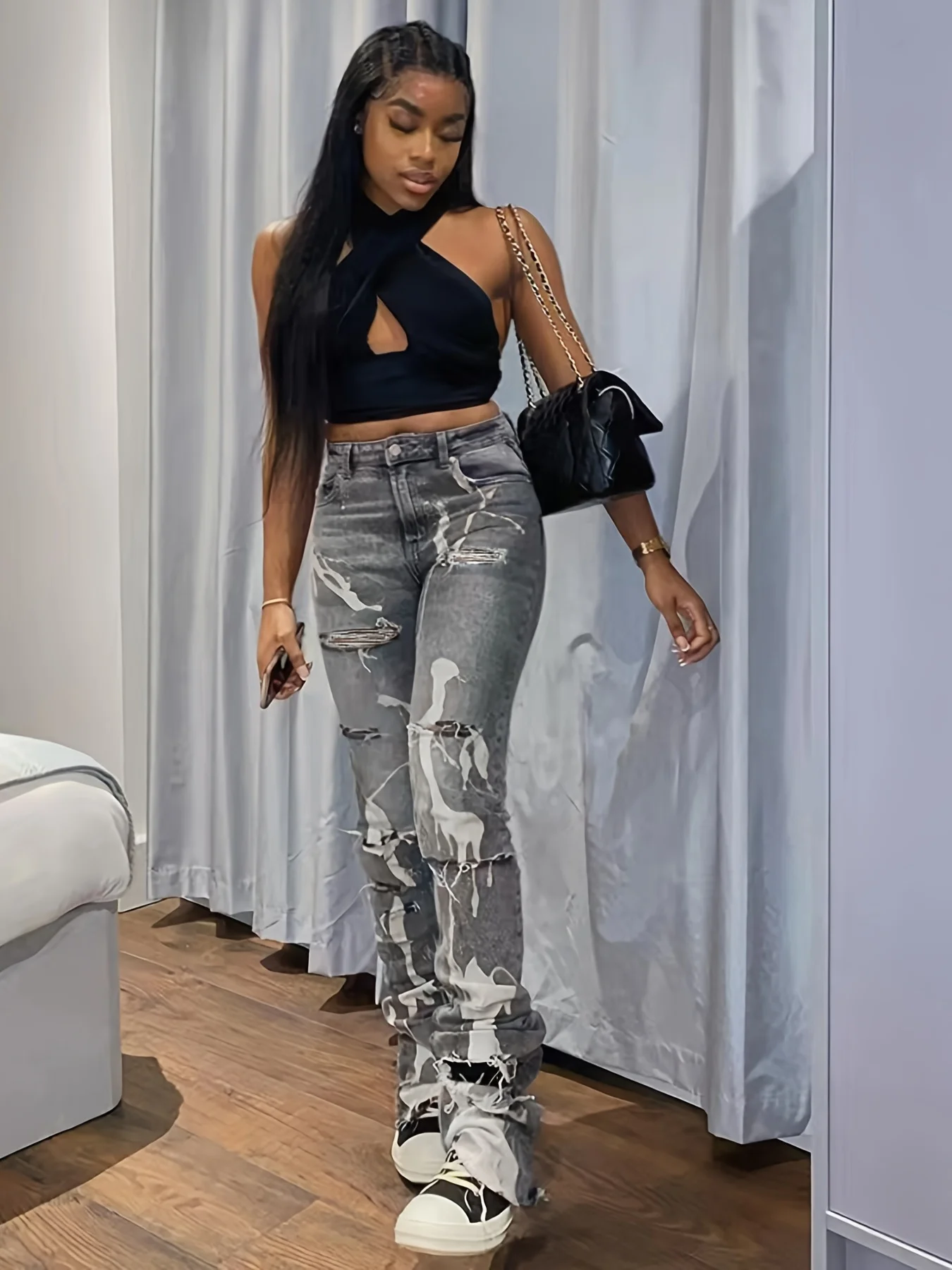 Popular female Spice Girl style slim-fit ripped jeans