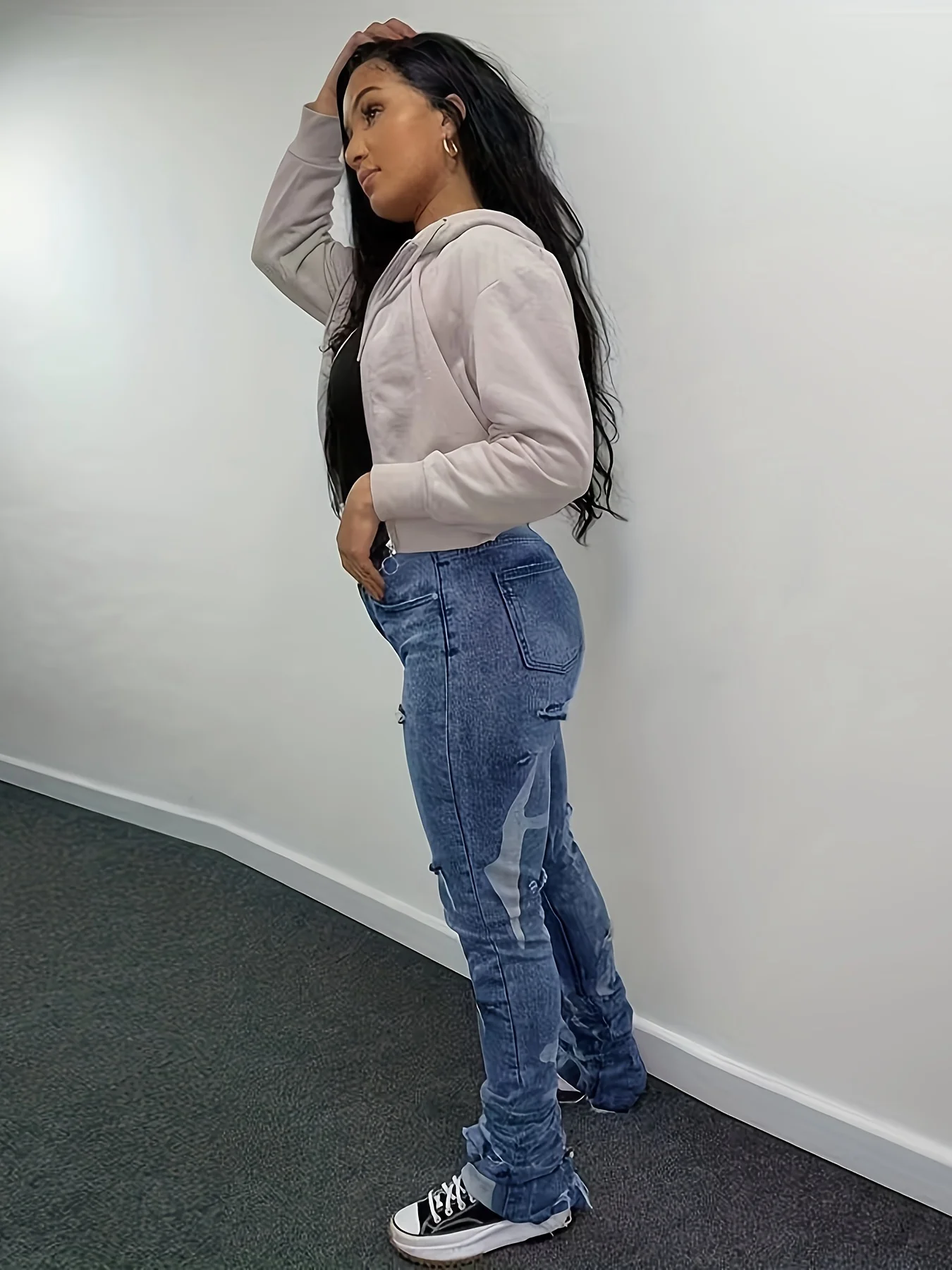 Popular female Spice Girl style slim-fit ripped jeans